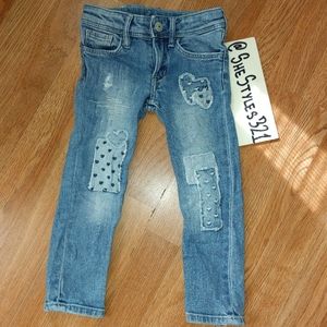 Distressed/Patchy Jeans